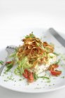 Sea bass with fried artichokes — Stock Photo