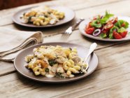 Oven-baked chicken with cavatappi pasta — Stock Photo