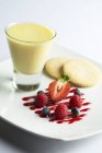 Closeup view of lemon Posset with fresh berries — Stock Photo