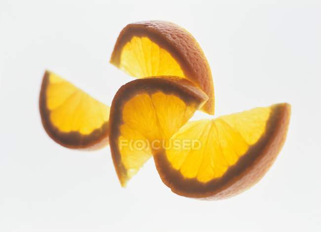Fresh orange wedges — Stock Photo