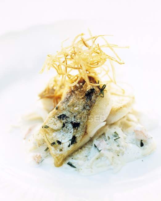 Fried fish fillet with onions — Stock Photo
