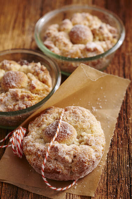 Small round orange and almond stollen in jars — Stock Photo