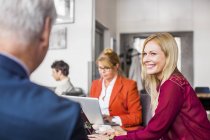 Business colleagues discussing in meeting — Stock Photo