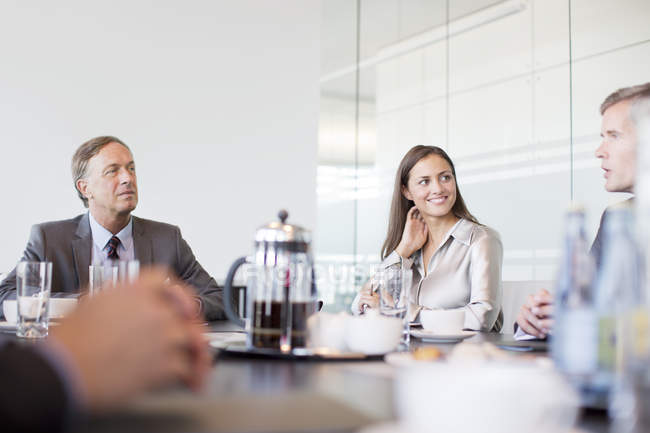 Business people talking in meeting at modern office — Stock Photo