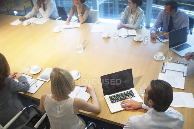 Business people sitting in meeting — Stock Photo