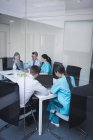 Team of doctors in a meeting at conference room — Stock Photo