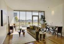 Living room in luxury highrise apartment — Stock Photo