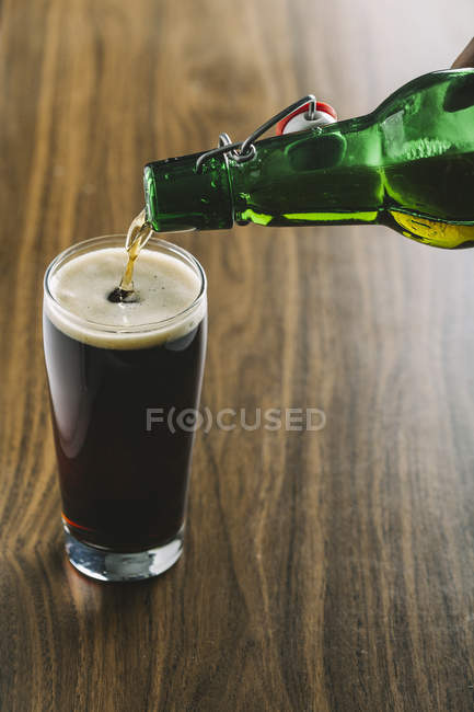 Stout beer in glass — Stock Photo