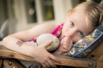 Girl sucking thumb — Stock Photo