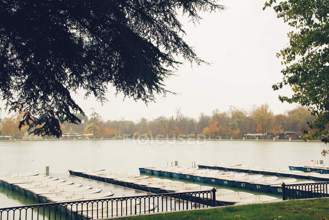 Boats moored on lake — Stock Photo