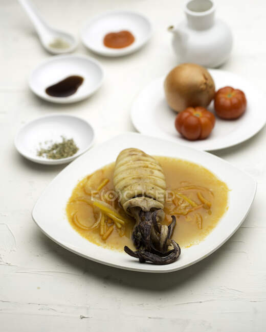 Sweet and sour squid dish with fresh ingredients — Stock Photo